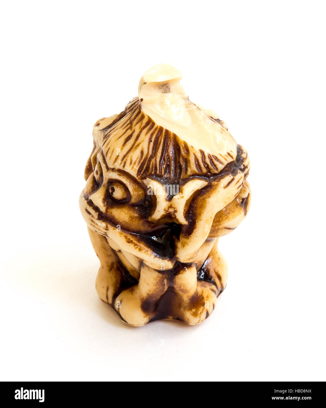 Japanese netsuke Three wise monkeys, sometimes called the three mystic apes, are a pictorial maxim. Stock Photo