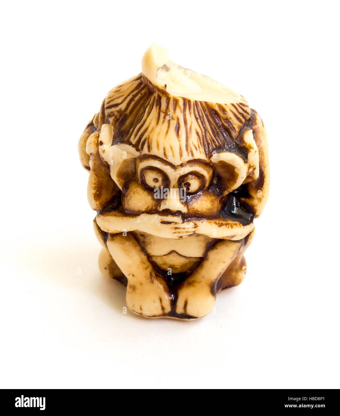 Japanese netsuke Three wise monkeys, sometimes called the three mystic apes, are a pictorial maxim. Stock Photo