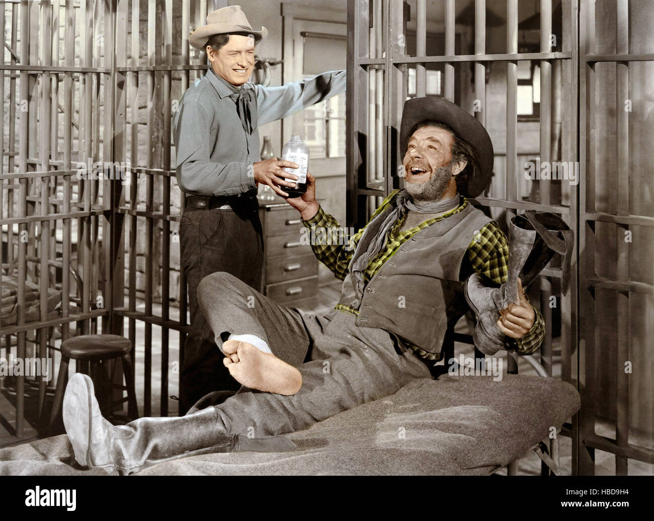 THE BOY FROM OKLAHOMA, from left Will Rogers Jr., Lon Chaney Jr., 1954