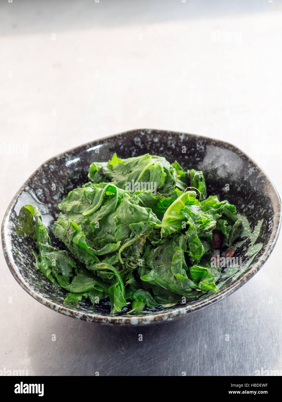 Japanese cuisine, fried mustard spinach called Komatsuna Stock Photo