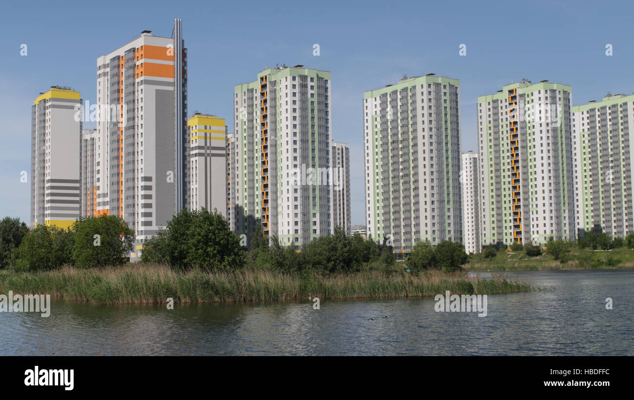 Image showcasing modern apartment buildings over the water Stock Photo - Alamy