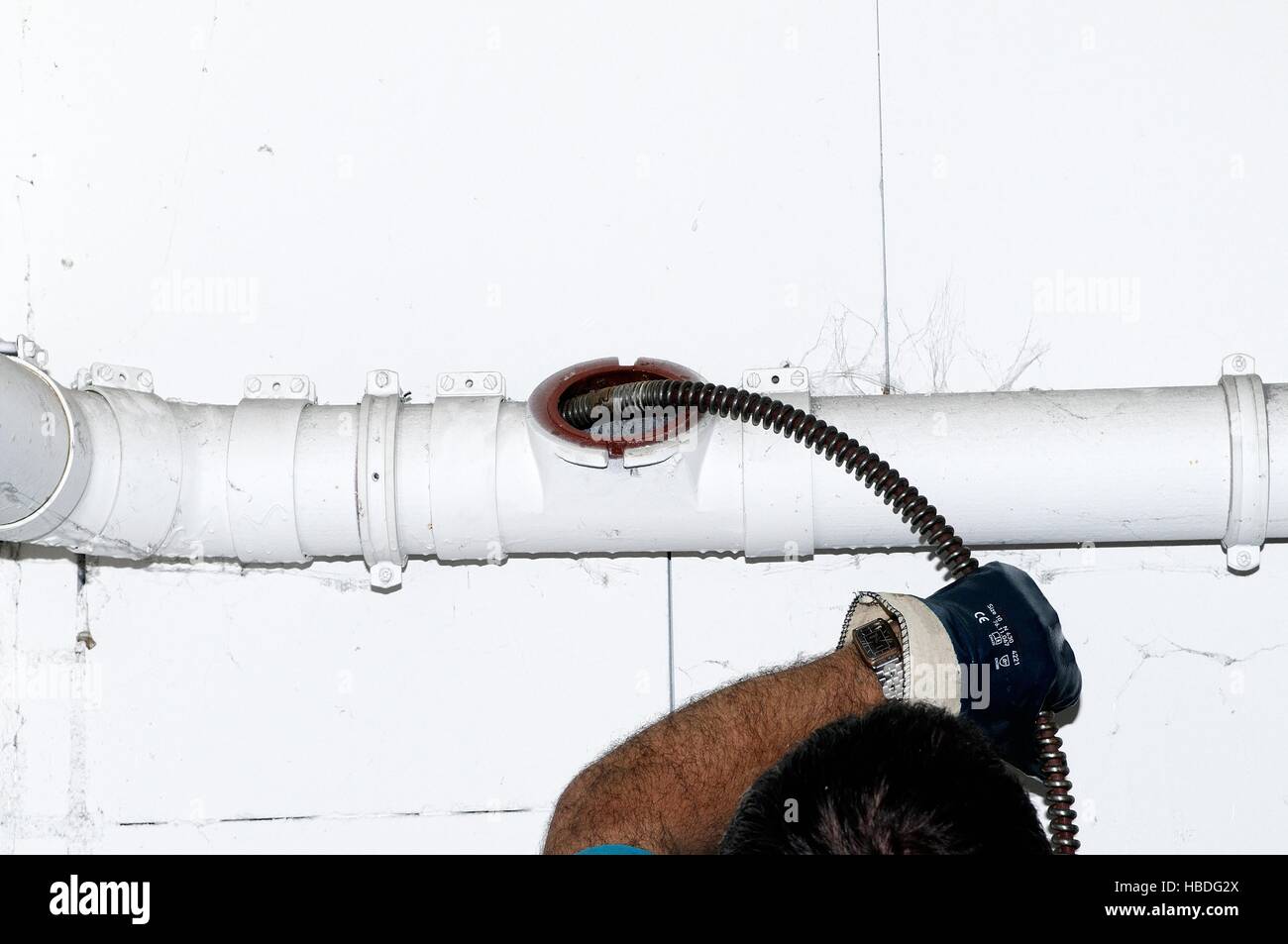 Drain cleaning cables in use Stock Photo Alamy