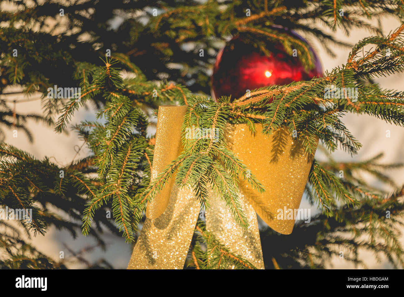 Golden knot hanging on a Christmas tree close up Stock Photo Alamy