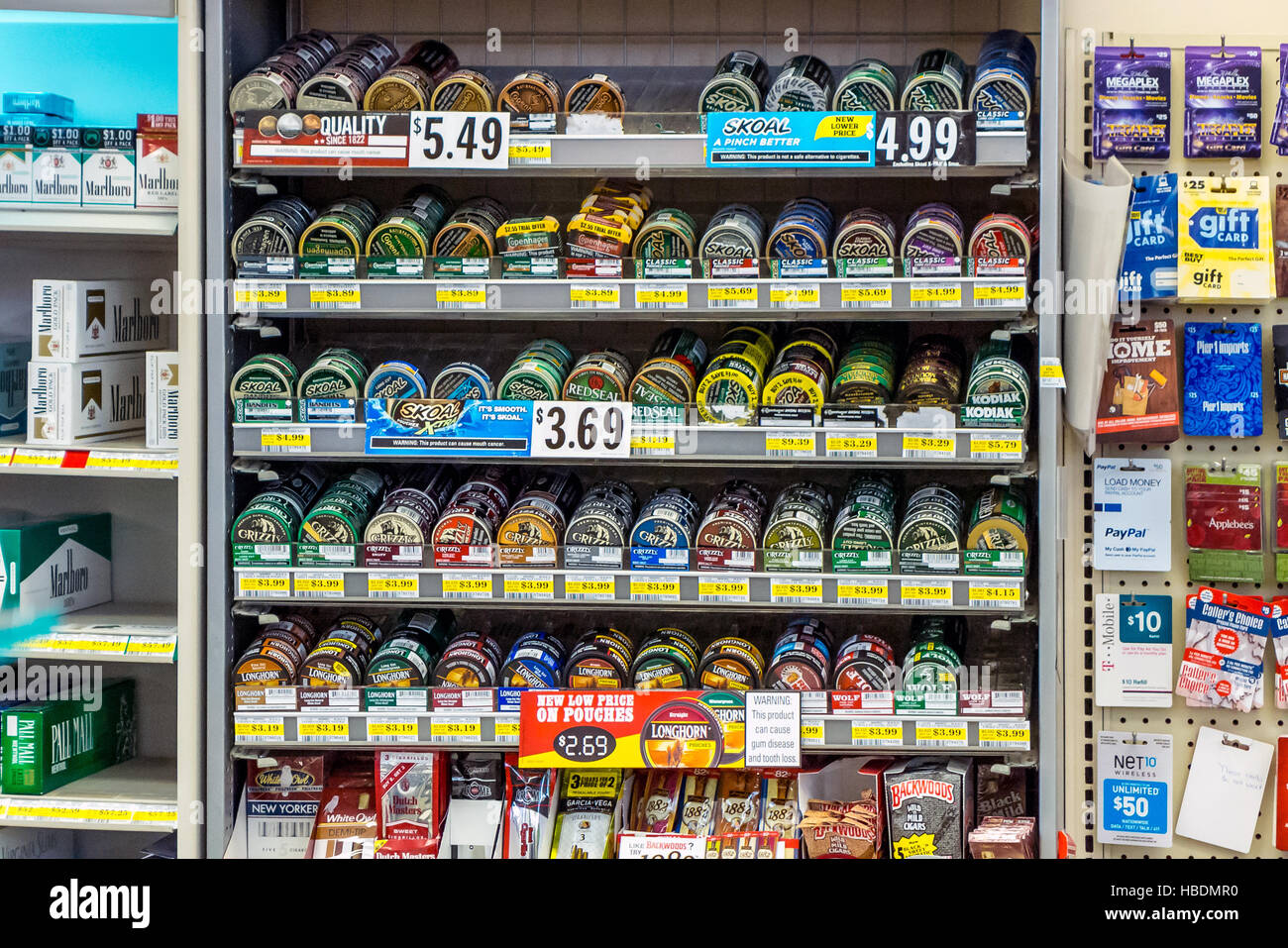 tobacco supermart Huge variety of tins of chewing tobacco available for sale in a supermarket  in rural America Stock Photo