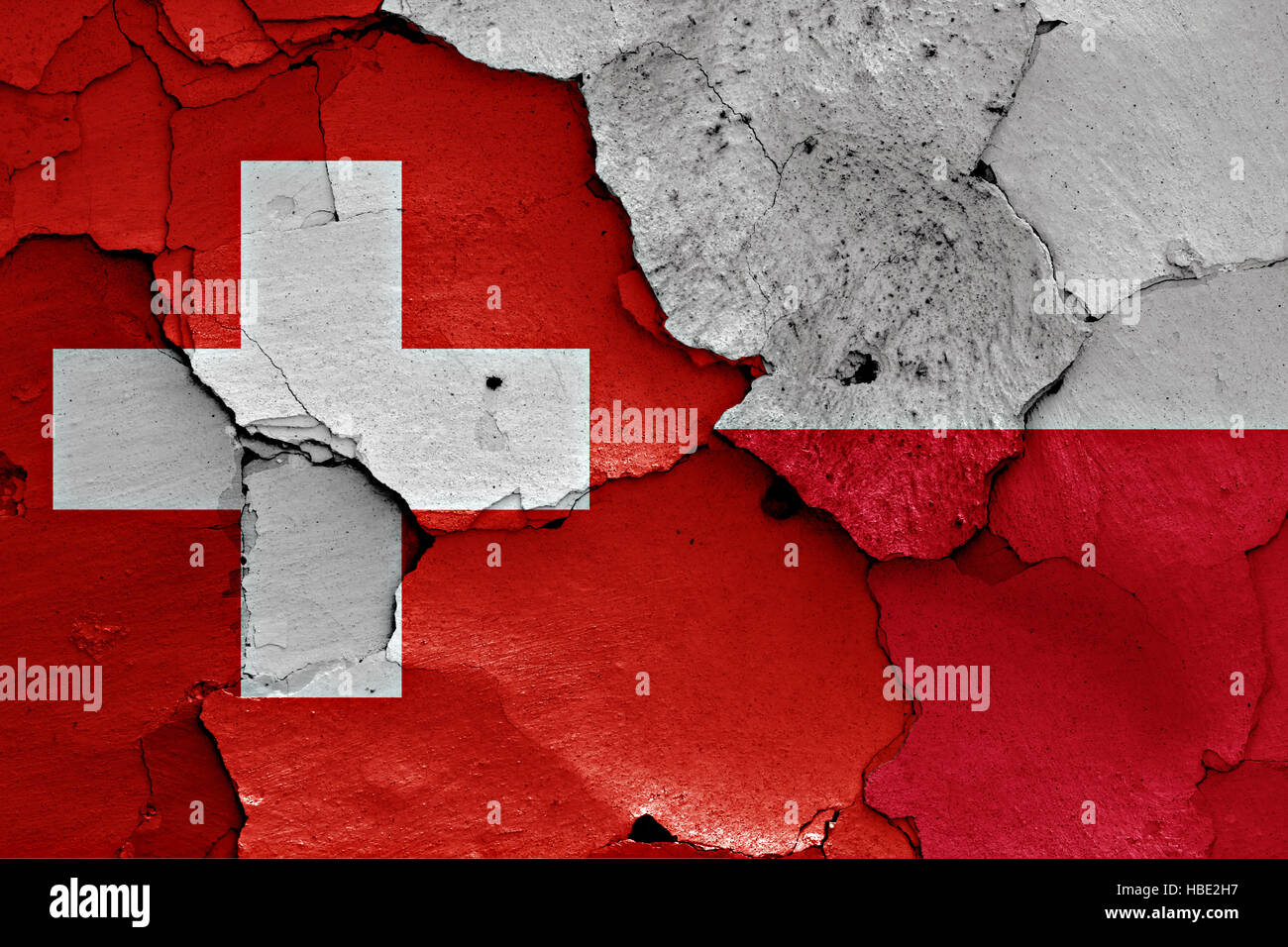flags of Switzerland and Poland painted on cracked wall Stock Photo - Alamy