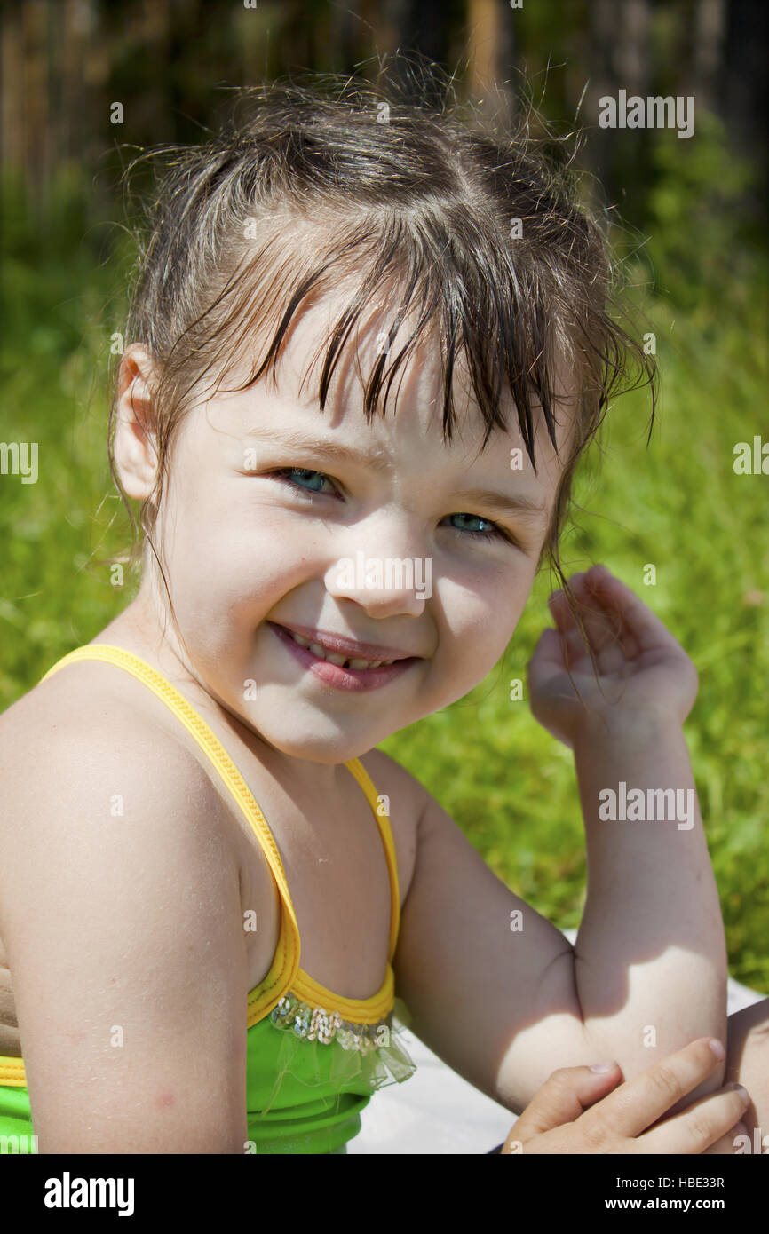 Baby girl wet after swimming Stock Photo Alamy