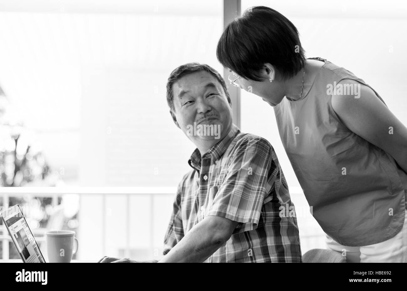 Senior Couple Using Laptop Concept Stock Photo