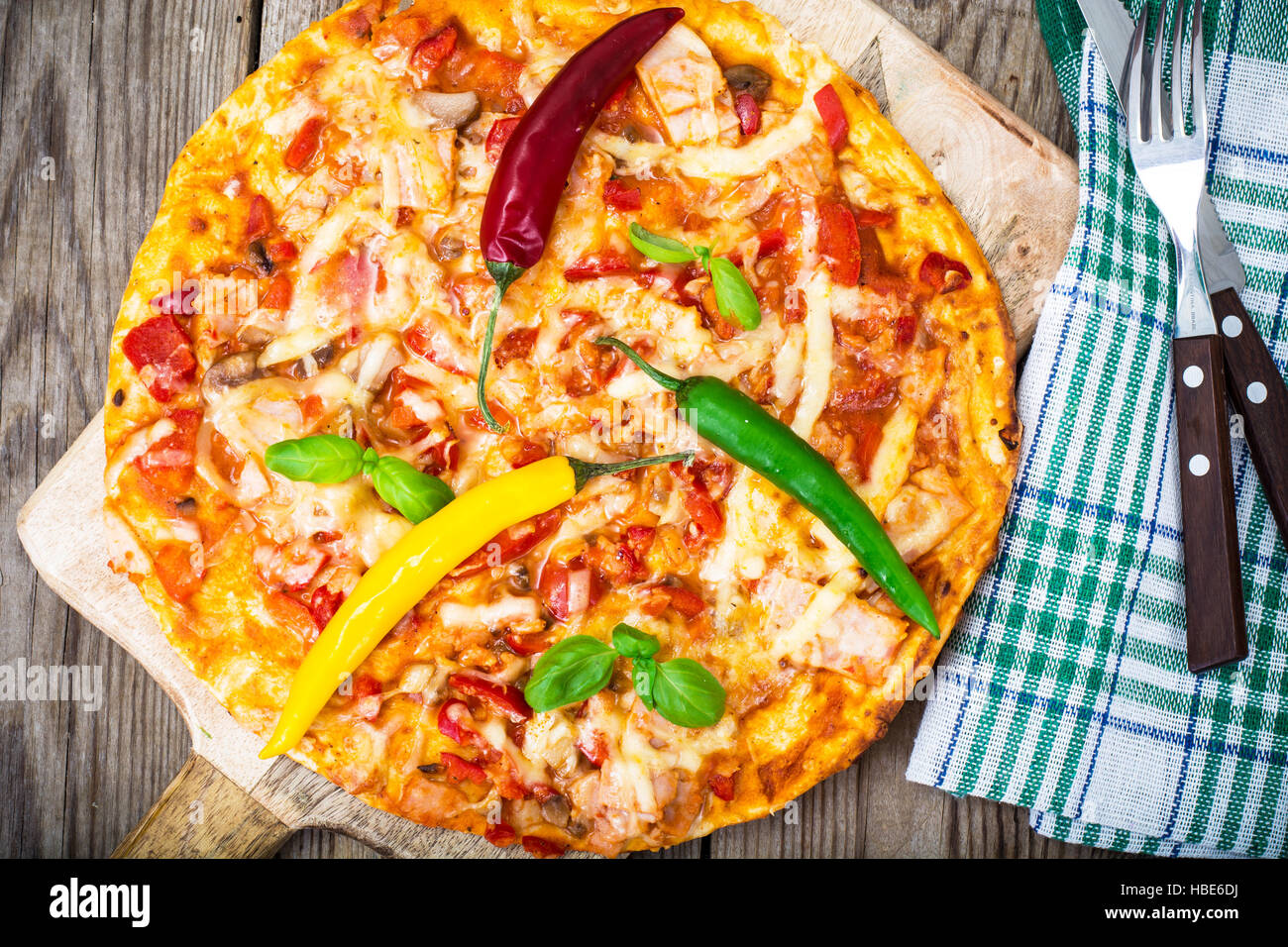 Pizza with prosciutto,mushroom and tomatoes Stock Photo Alamy