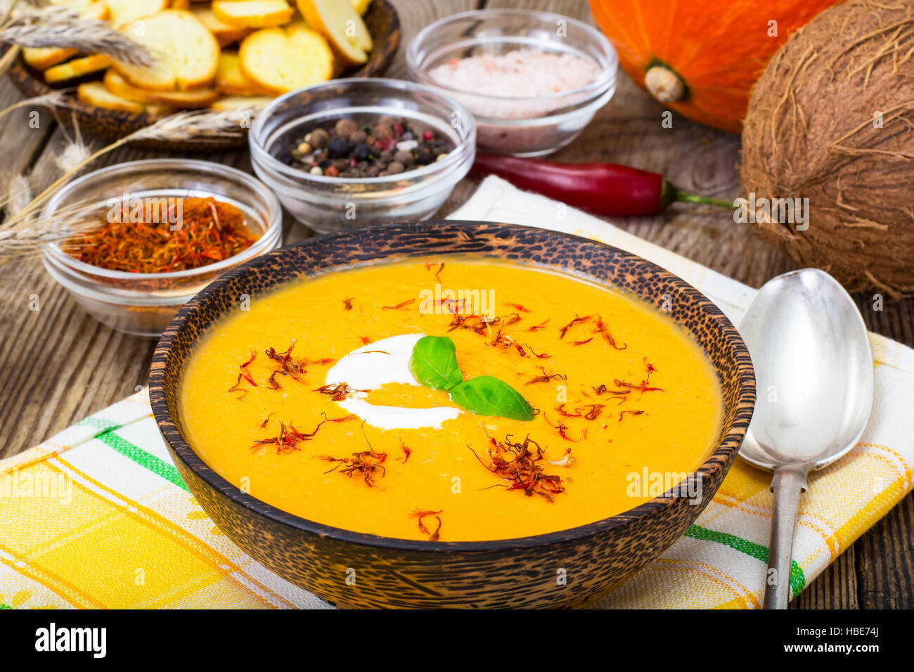 Spicy pumpkin soup with coconut milk Stock Photo