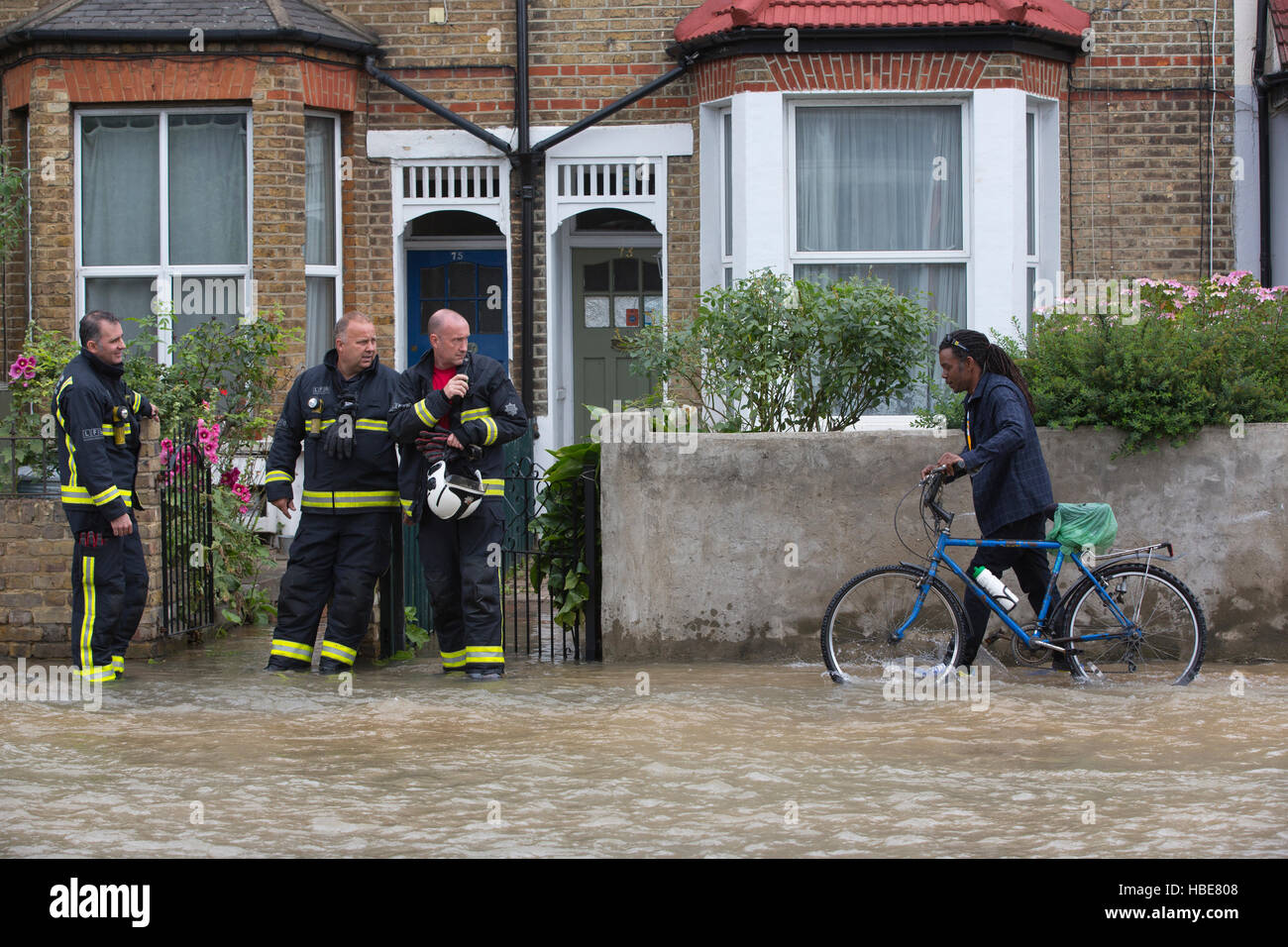 Broken water main pipe causes widespread floods in South Wimbledon, London, England, United Kingdom Stock Photo