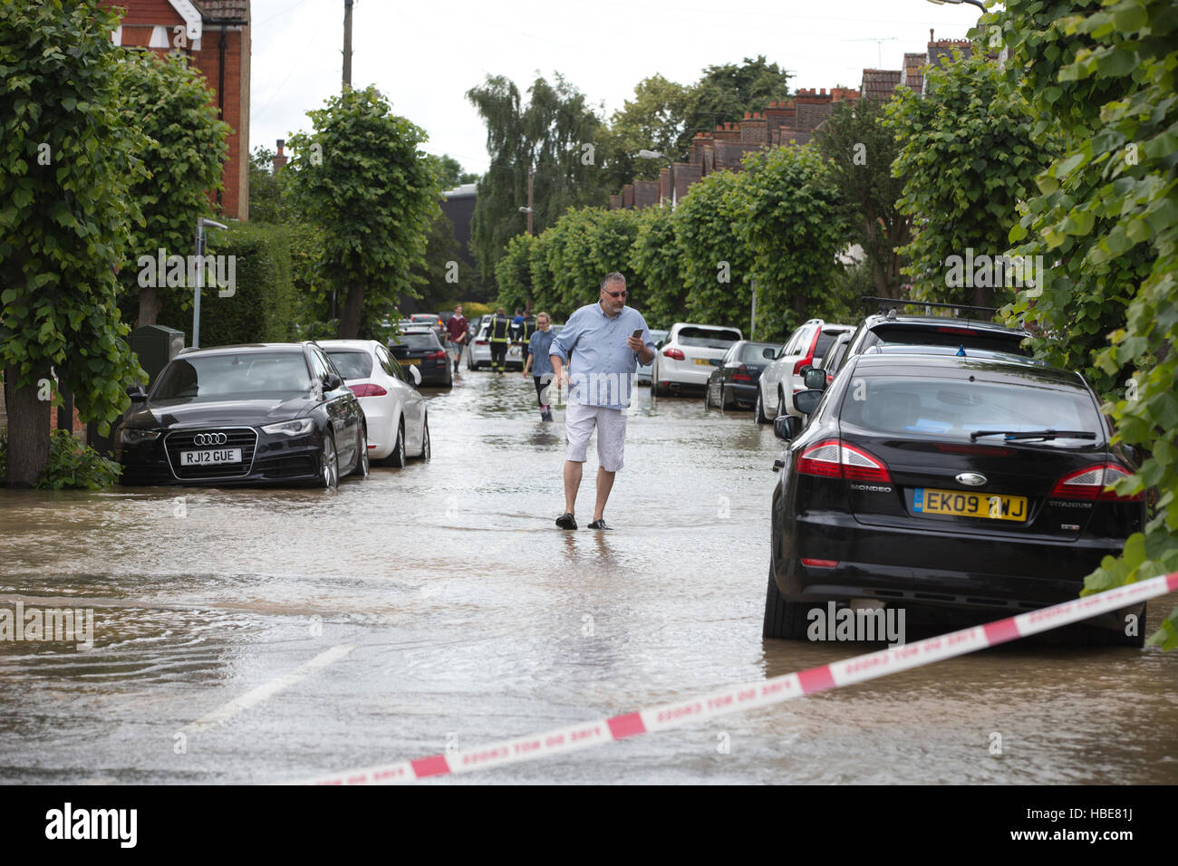 Broken water main pipe causes widespread floods in South Wimbledon, London, England, United Kingdom Stock Photo