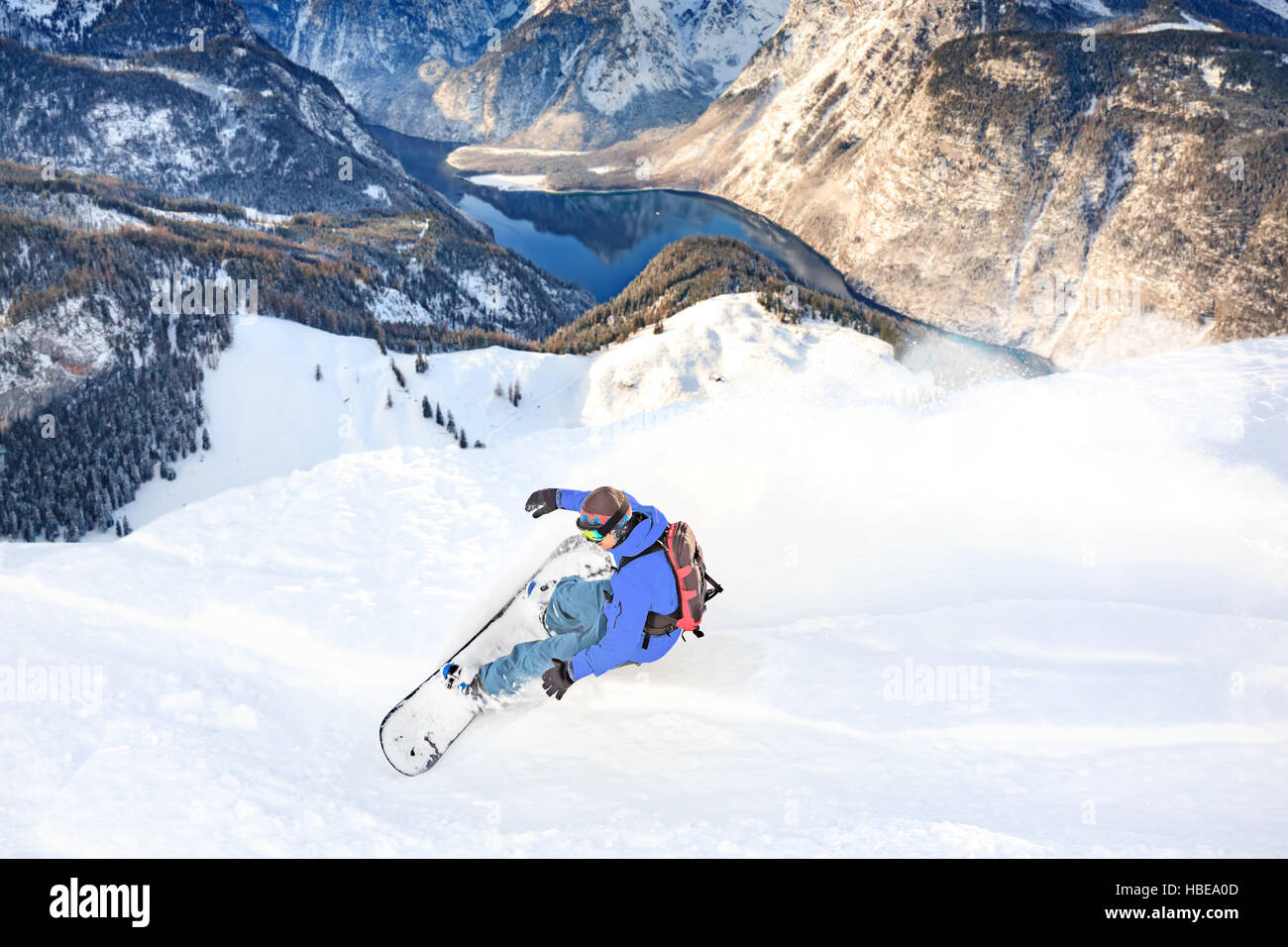 the snowboarder on the piste in Alps by Lech, Austria. Stock Photo