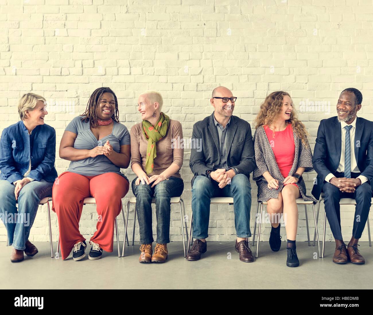 Diverse Group of People Community Togetherness Sitting Concept Stock ...