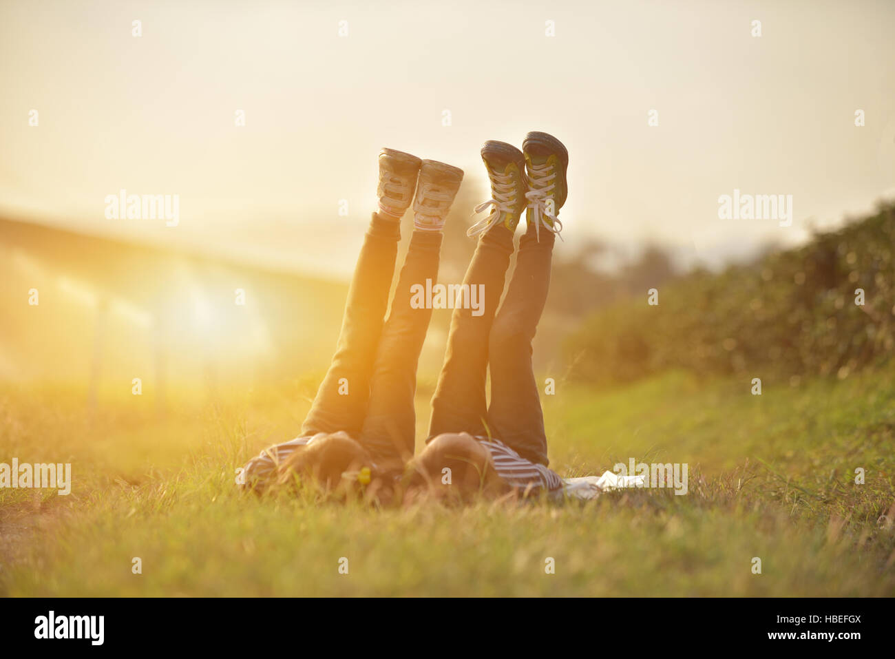 Group children lying on grass hi-res stock photography and images - Alamy