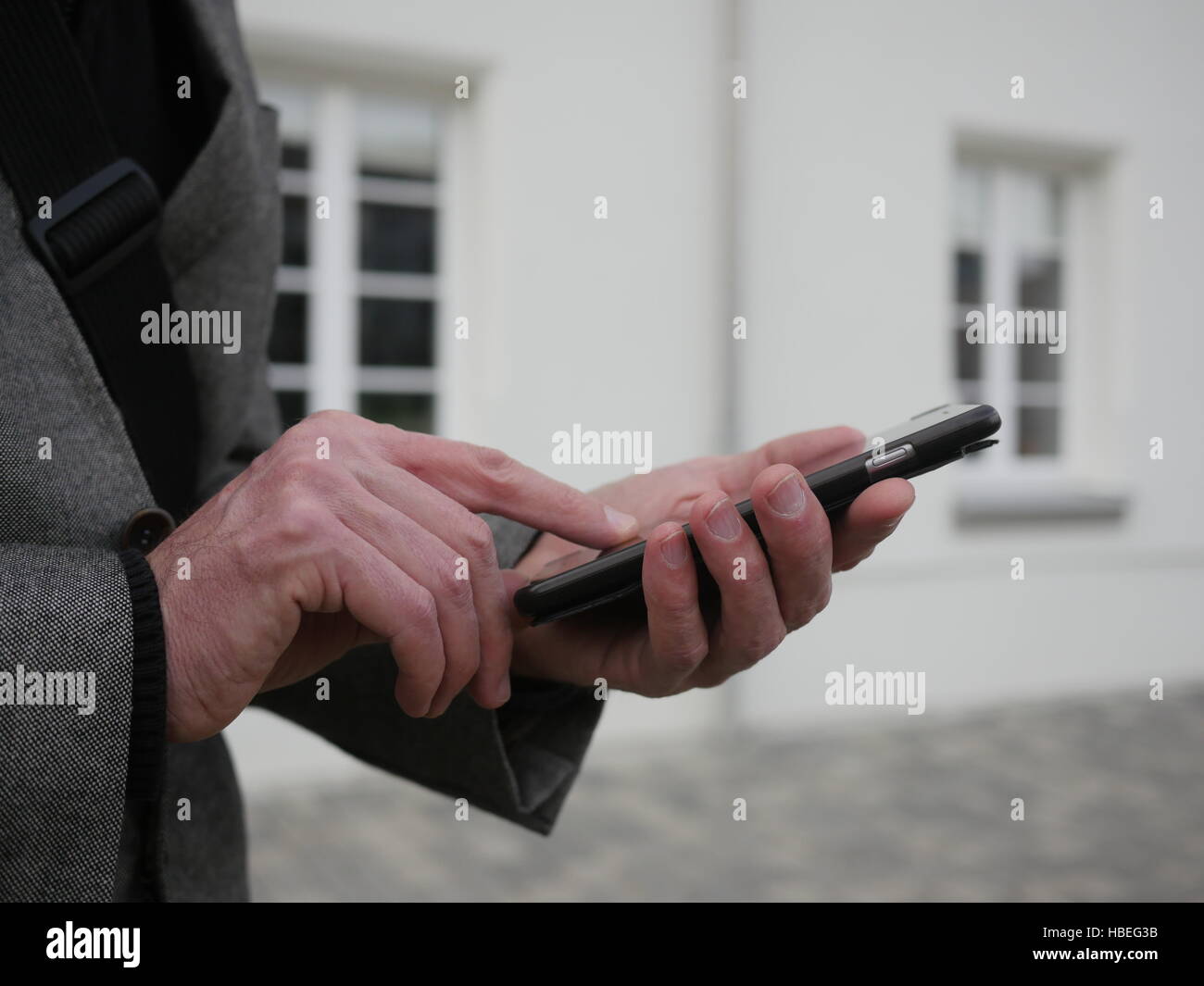 Close up of a man using mobile smart phone Stock Photo - Alamy