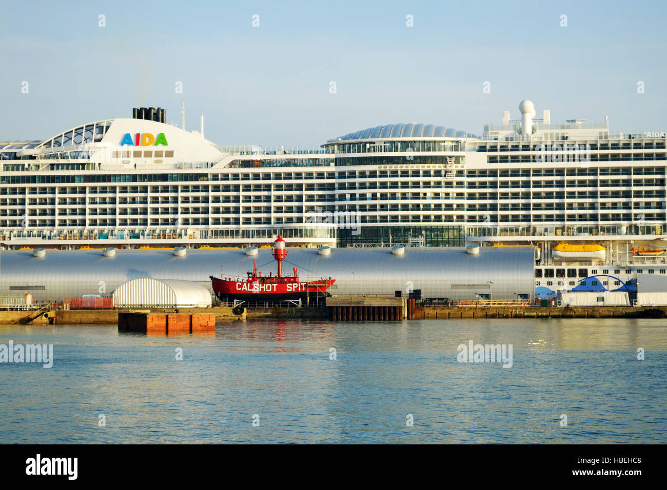 Cruise liner AIDA Prima and Calshot spit lightship at at Ocean Cruise Terminal (Berth 46) in Southampton, UK Stock Photo