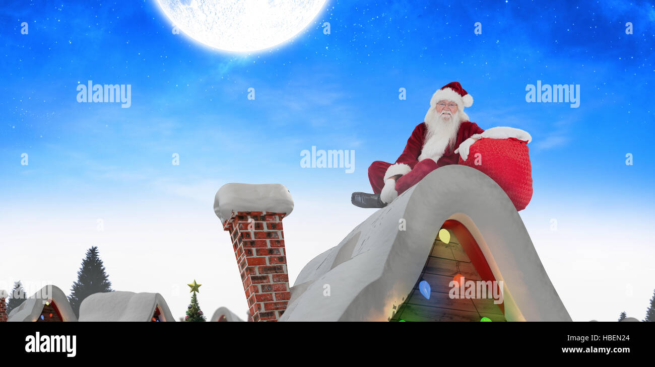 Composite image of santa sits next to his bag Stock Photo