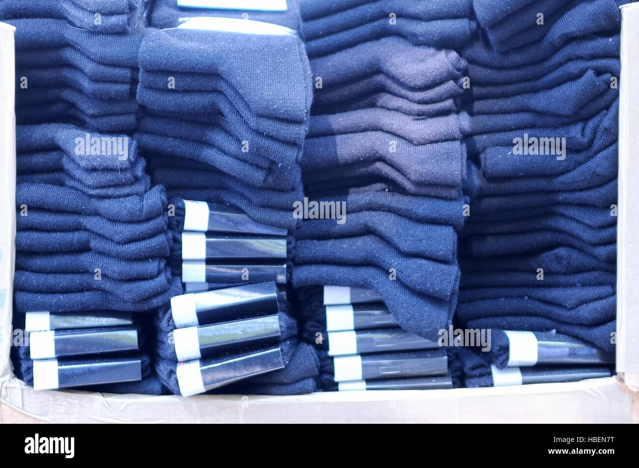 Box full of new blue socks Stock Photo