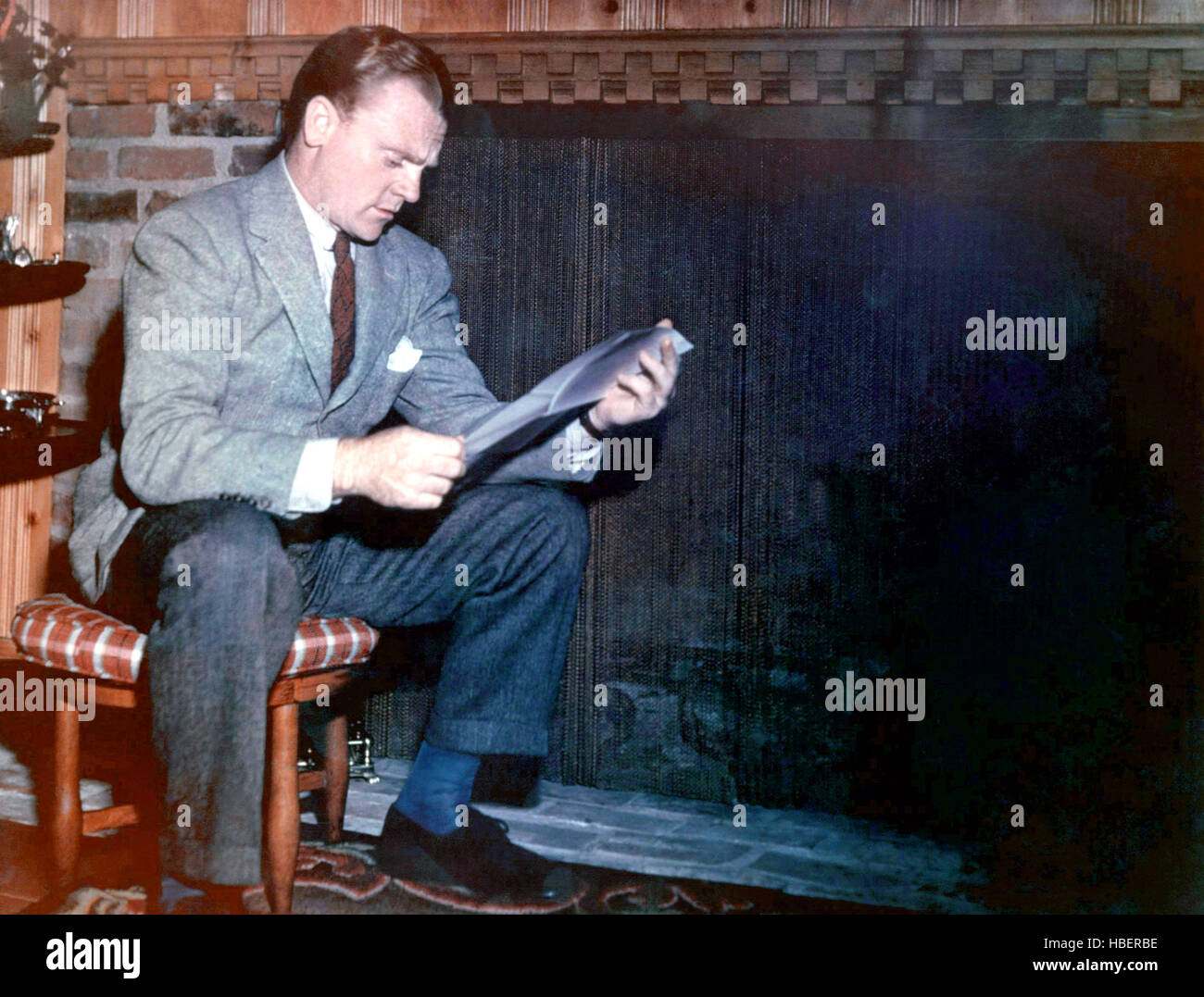 Studing Script NEVER STEAL ANYTHING SMALL, James Cagney, studying script, 1959 Stock ...