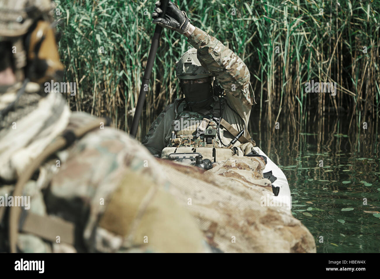 Spec ops in the military kayak Stock Photo - Alamy