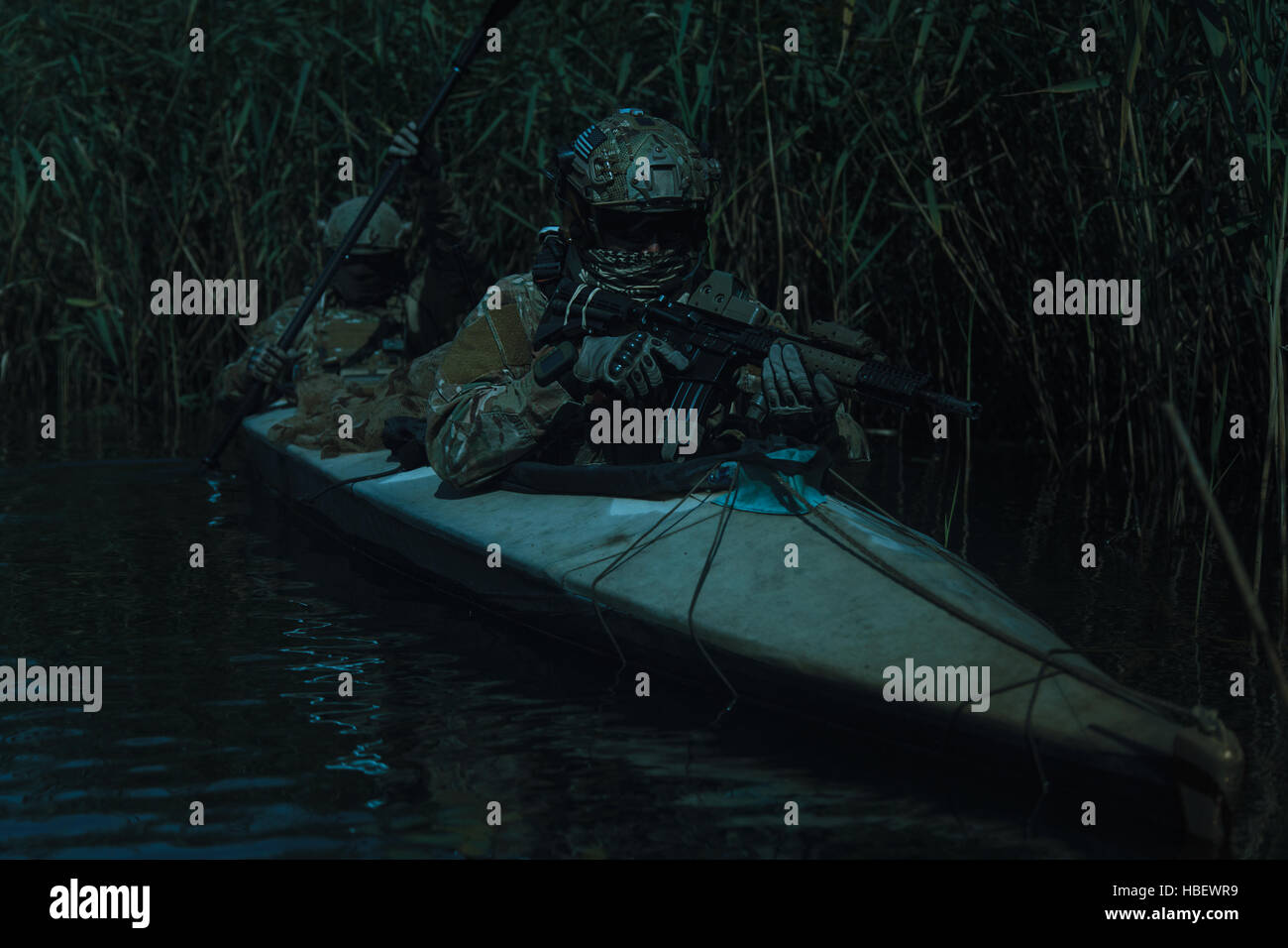 Spec ops in the military kayak Stock Photo - Alamy