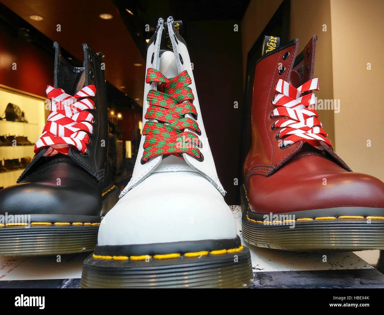 A display of Dr. Martens shoes showing their Christmas spirit in the window of a Dr. Martens store in New York on Saturday, November 26, 2016,   (© Richard B. Levine) Stock Photo