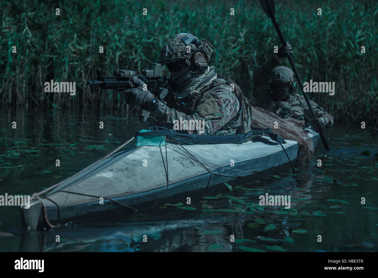 Spec ops in the military kayak Stock Photo - Alamy