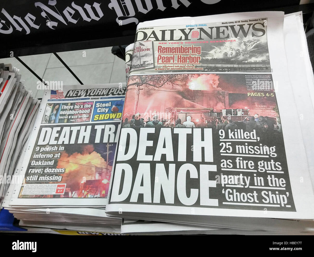 Front pages on Sunday, December 4, 2016 of the New York Daily News and New York Post report on the previous day's fire in a warehouse, allegedly used as artists' residences, during a dance party. Nine people are confirmed dead with up to 25 missing.  (© Richard B. Levine) Stock Photo