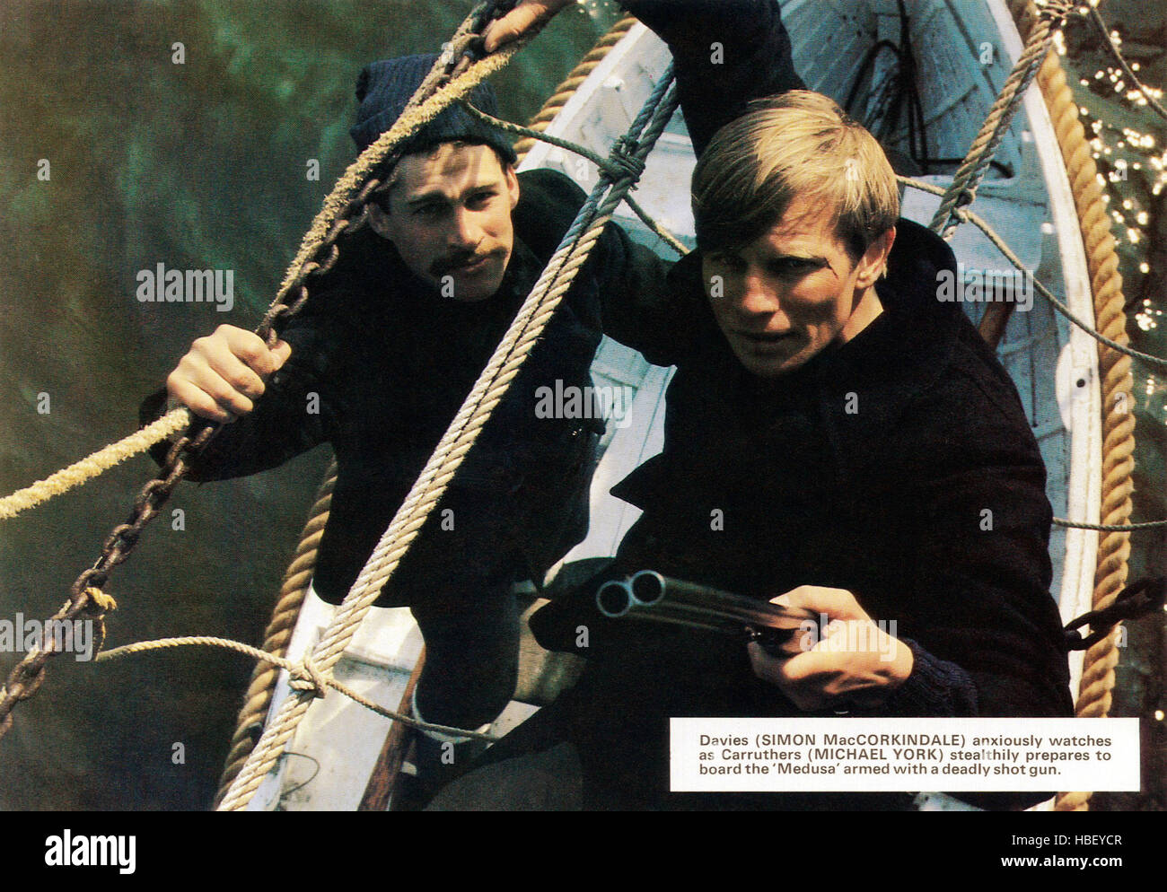 THE RIDDLE OF THE SANDS, from left: Simon McCorkindale, Michael York ...