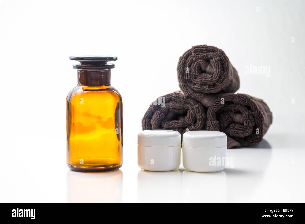 Dose with towels and essential oils Stock Photo
