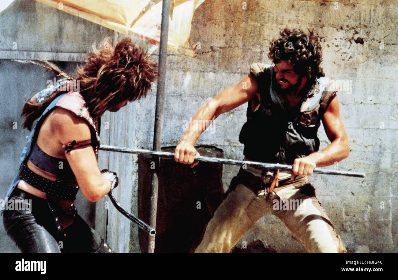 STEEL DAWN, from left Christopher Neame, Patrick Swayze, 1987