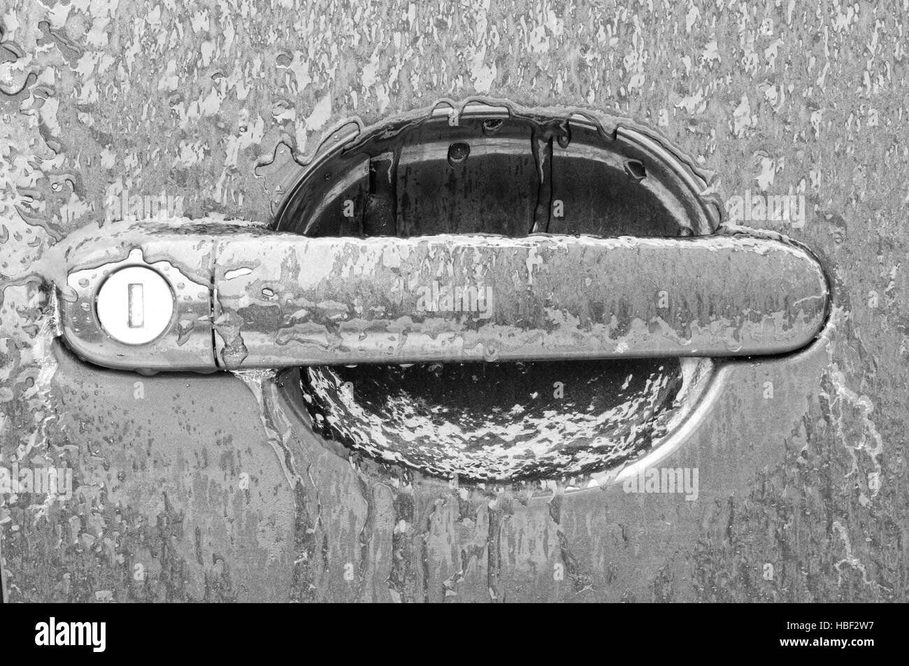 icy car door lock black and white Stock Photo