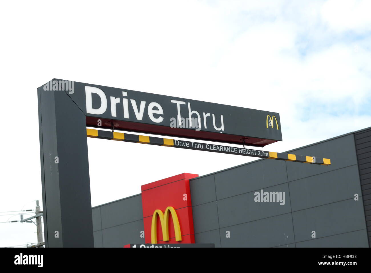 Australian fast food chain meal Mc Donald's drive thru sign Stock Photo