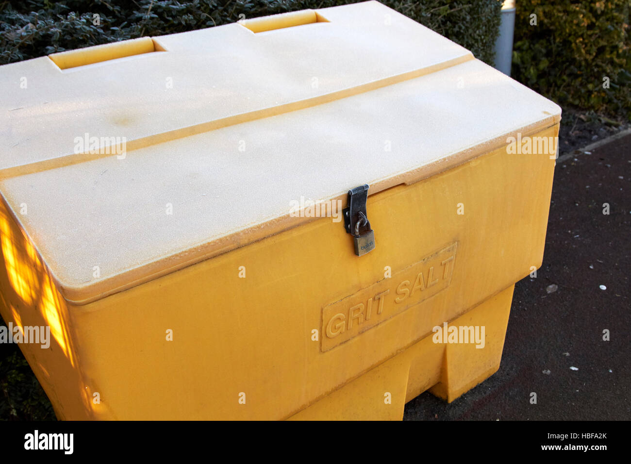 frost covered locked grit salt bin in the uk Stock Photo