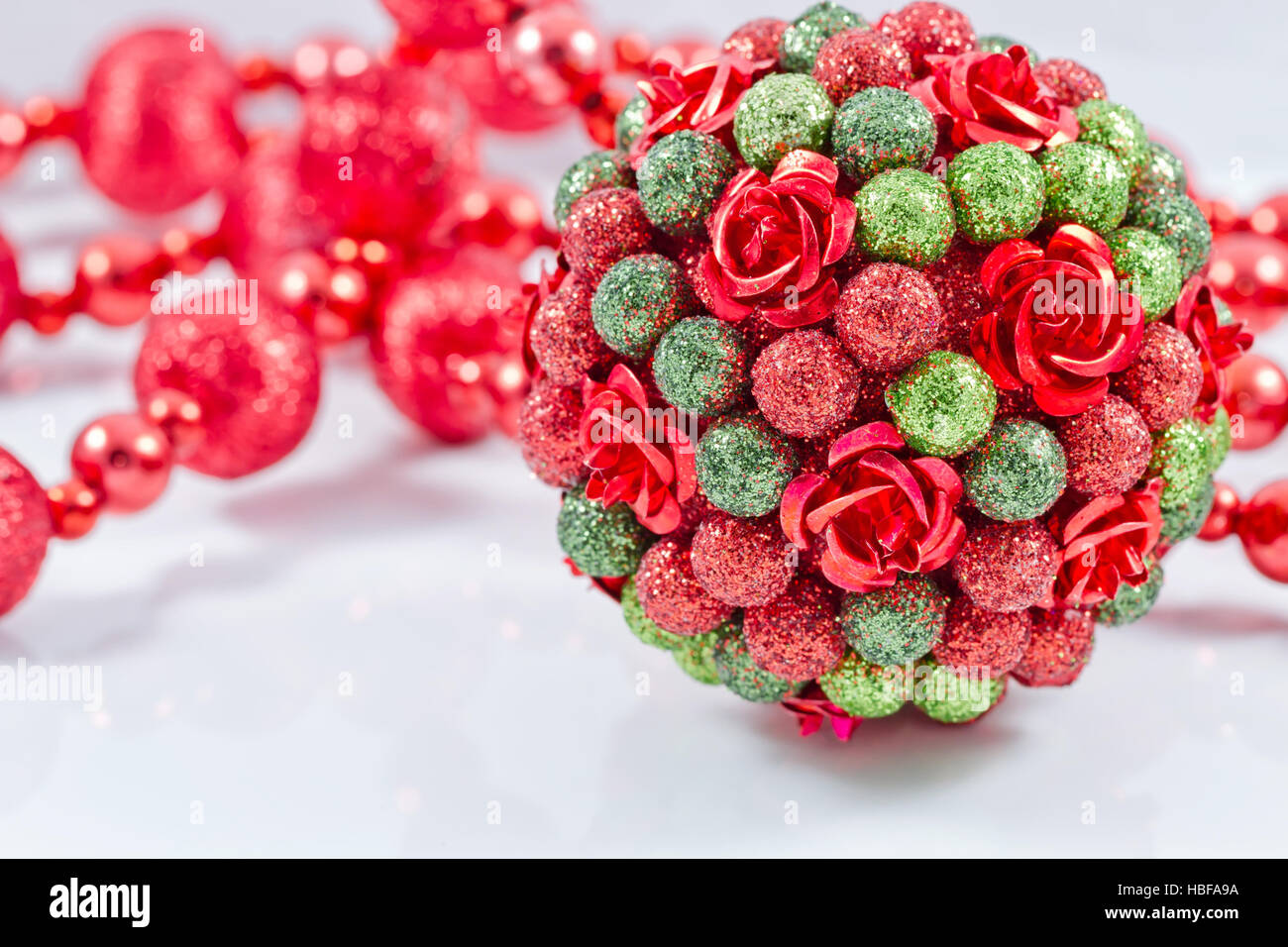 Christmas tree balls with red garland Stock Photo