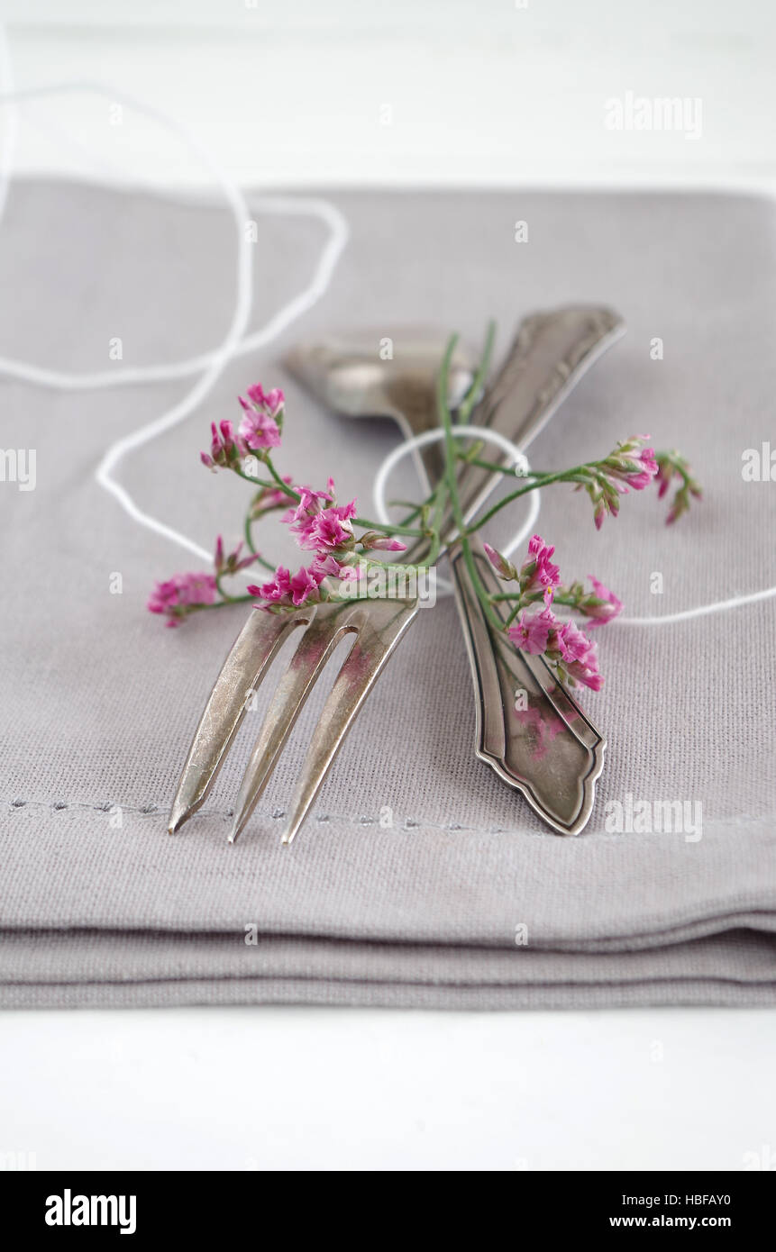 napkin, cake fork and little flower Stock Photo Alamy