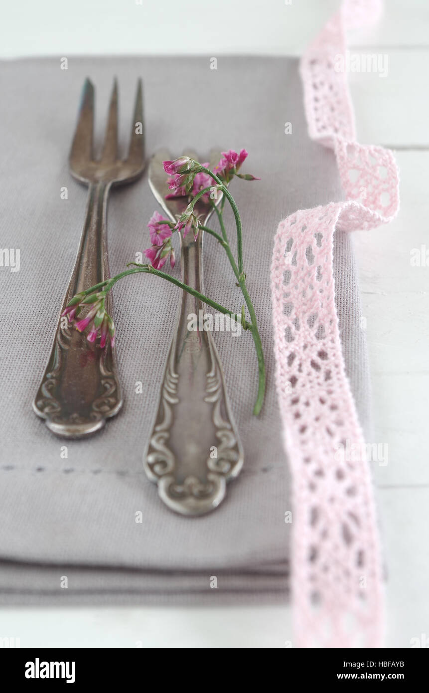 napkin, cake fork and little flower Stock Photo Alamy