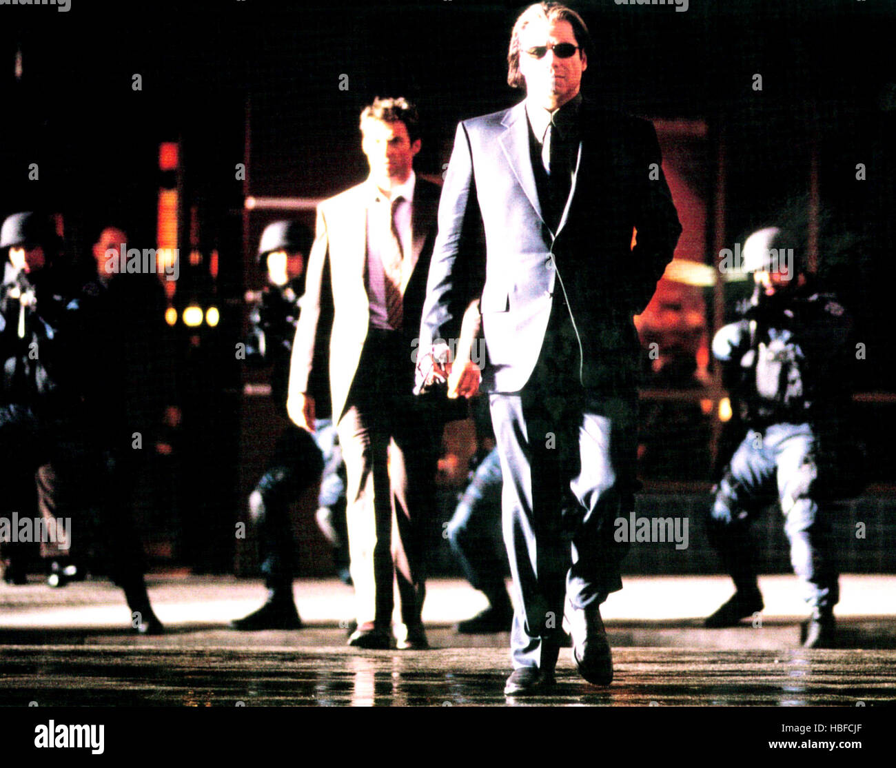 SWORDFISH, John Travolta (front), Hugh Jackman (center), 2001, © Warner Brothers/courtesy