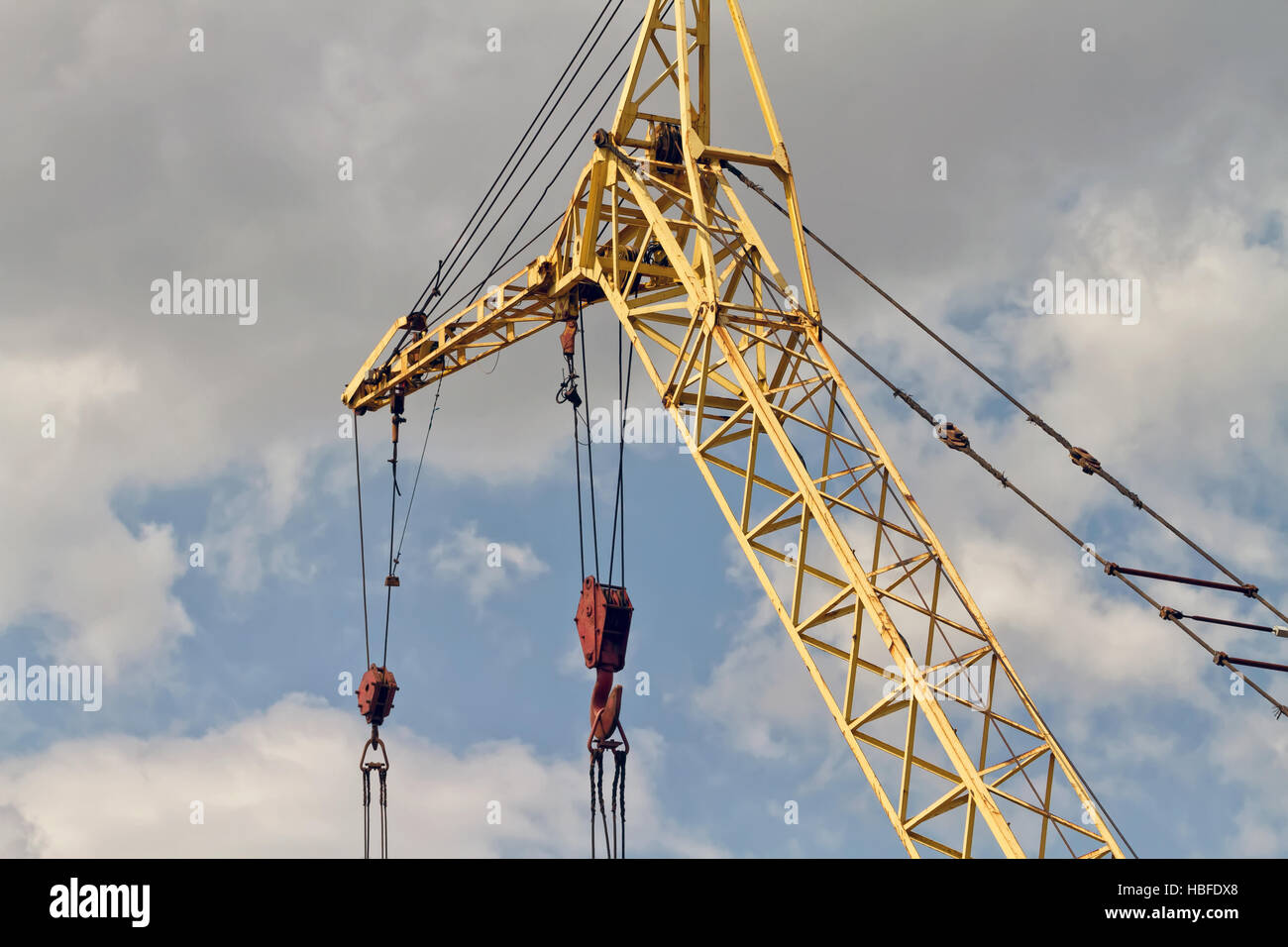 Boom crawler crane with hooks and ropes Stock Photo