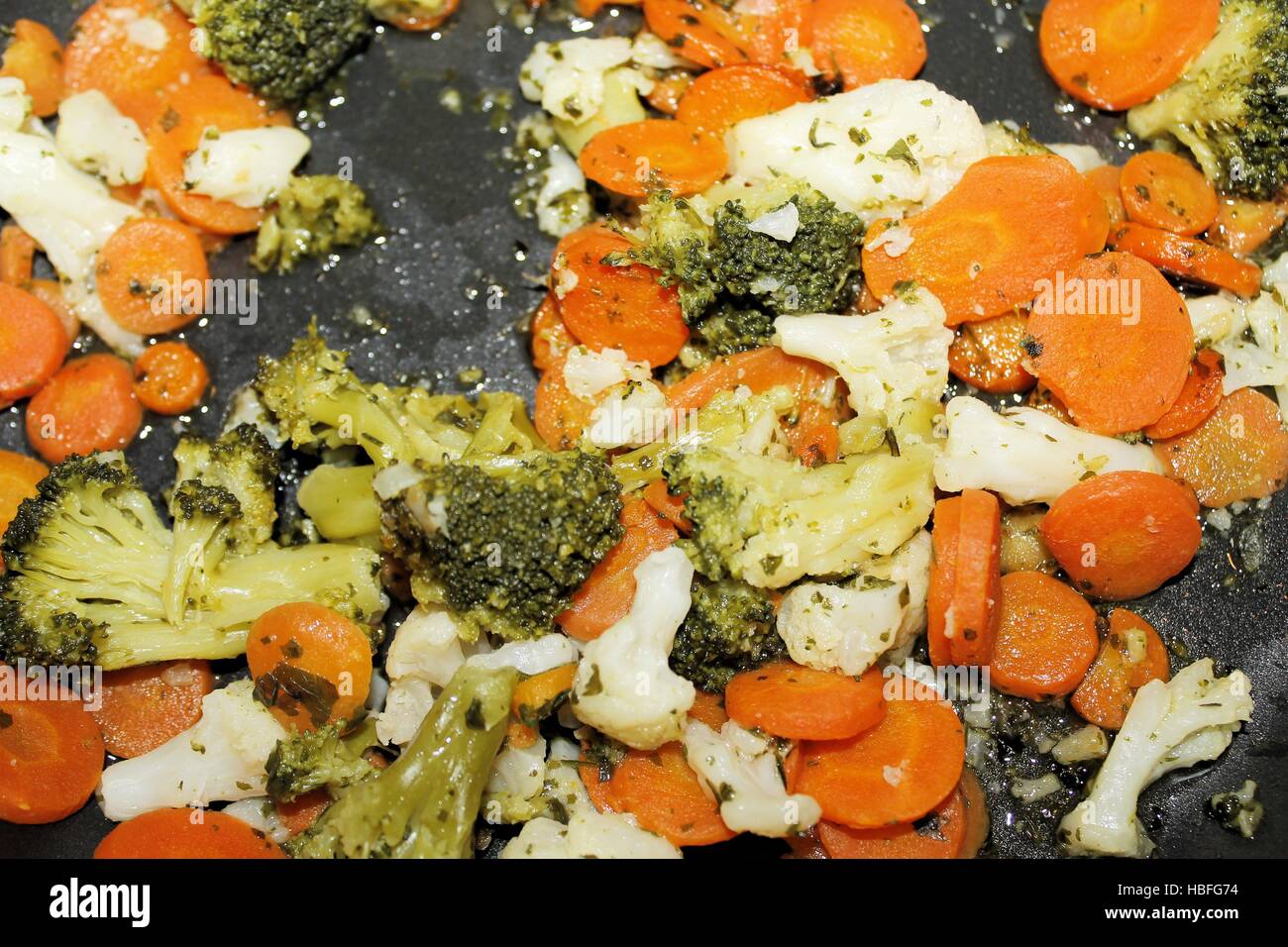 carrots and broccoli in cooking pot Stock Photo Alamy