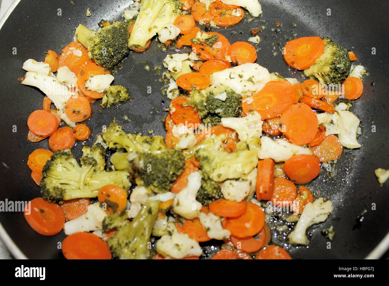 carrots and broccoli in cooking pot Stock Photo Alamy
