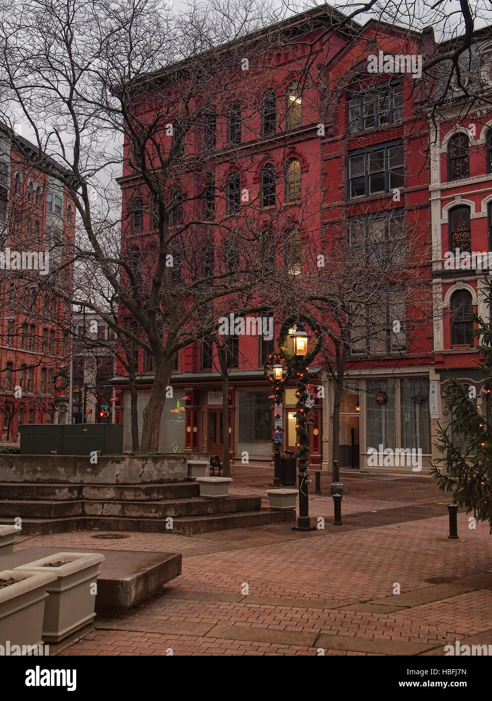 Syracuse, New York, USA. December 3, 2016. Apartments and store fronts