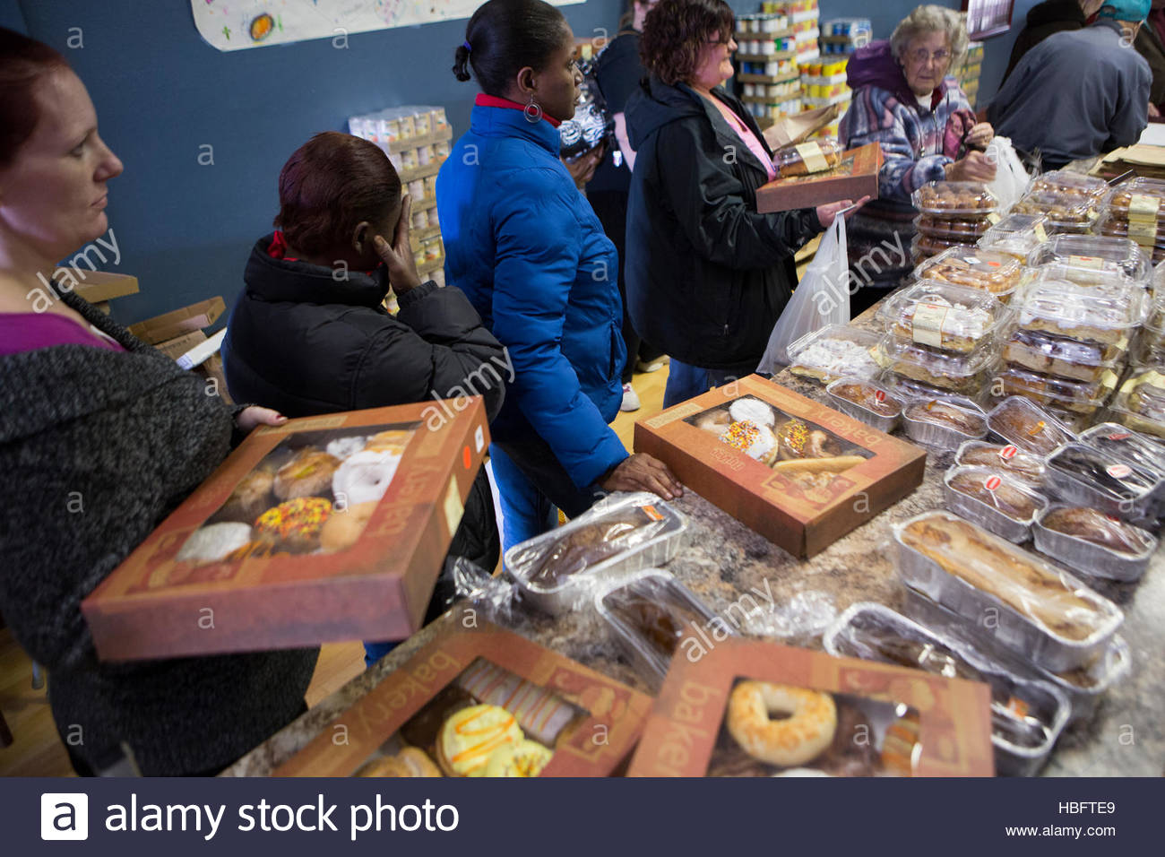 People Stand In Line For Food At The Jordan River Food Pantry