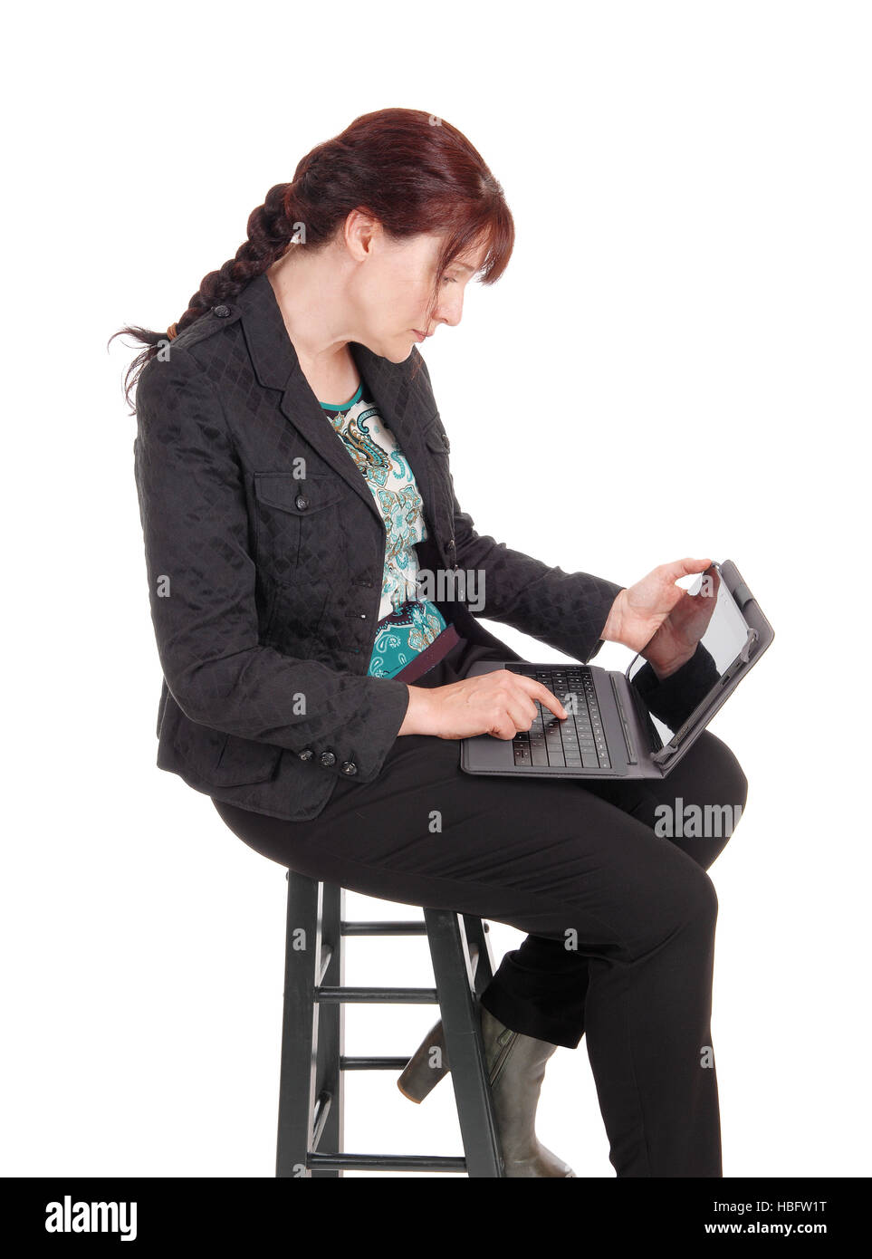 Woman working on her laptop. Stock Photo