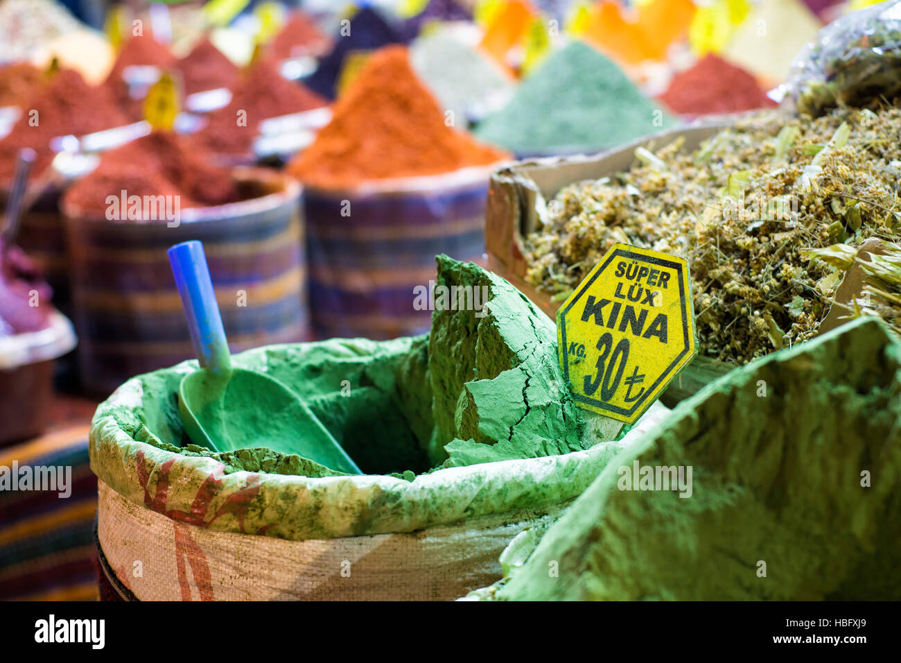 Henna in a sack with colorful spices background at oriental spice bazaar in Istanbul, Turkey Stock Photo