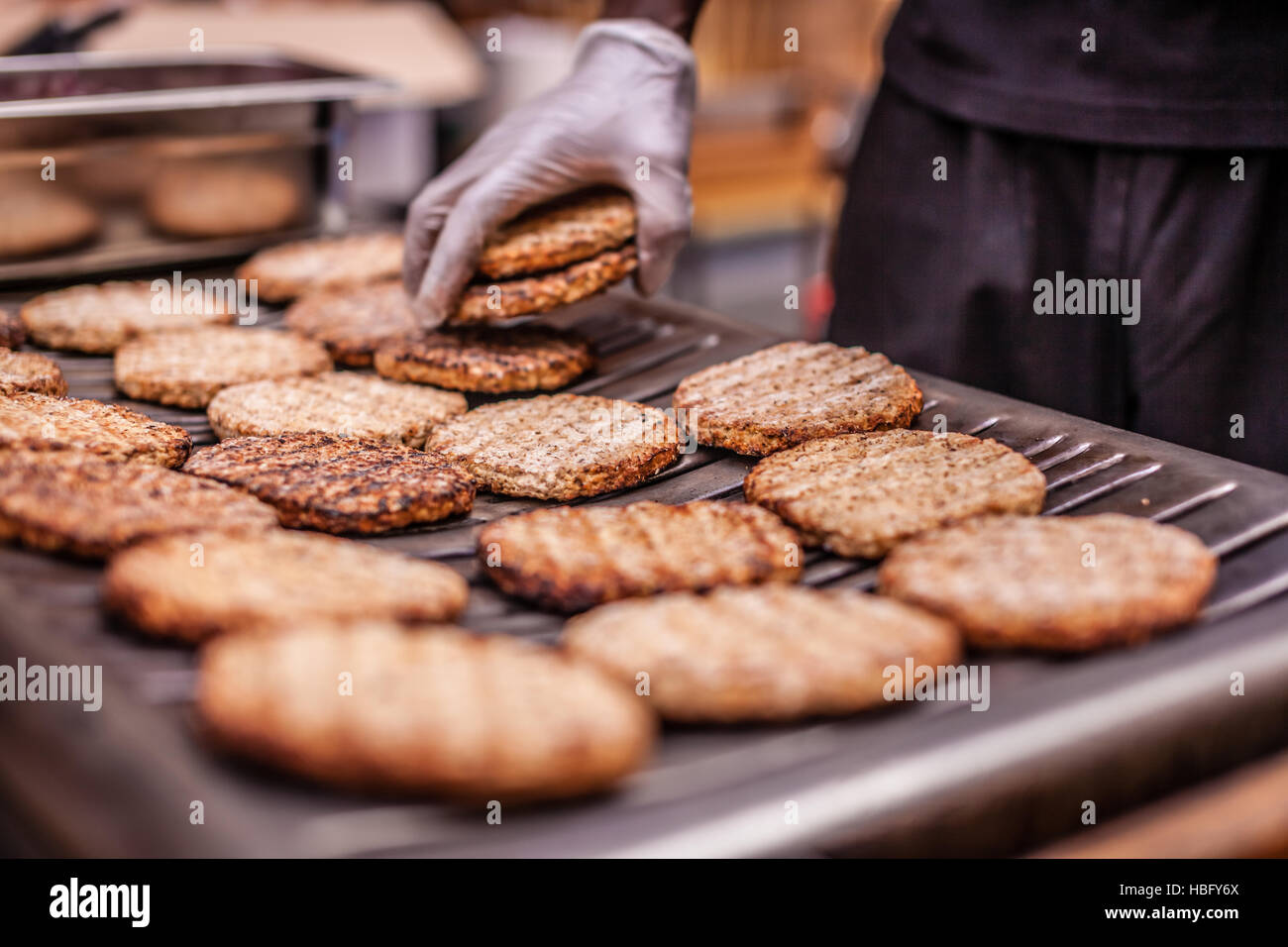 Burgers on barbecue Stock Photo Alamy