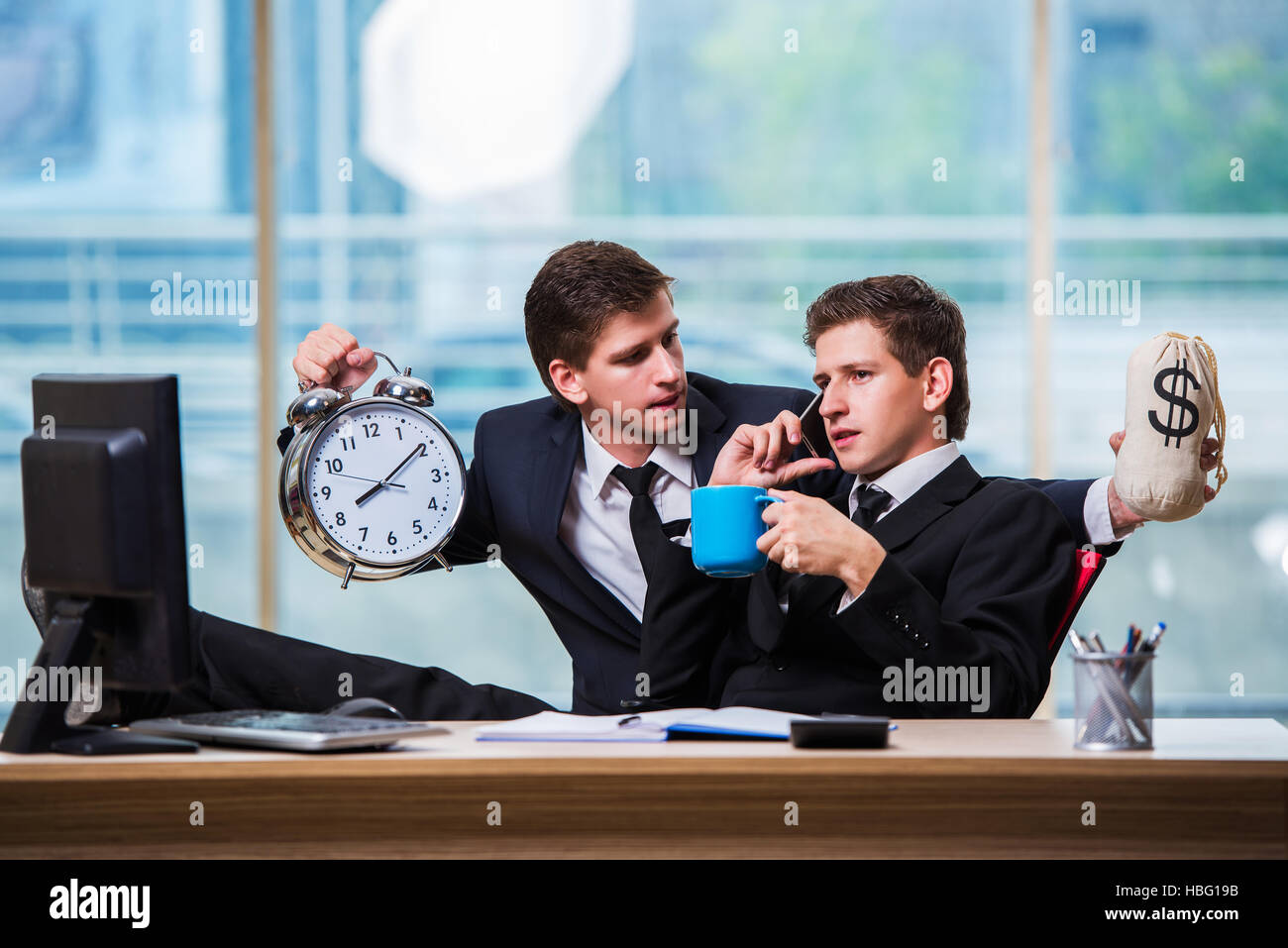 Time is money concept with two businessman Stock Photo - Alamy