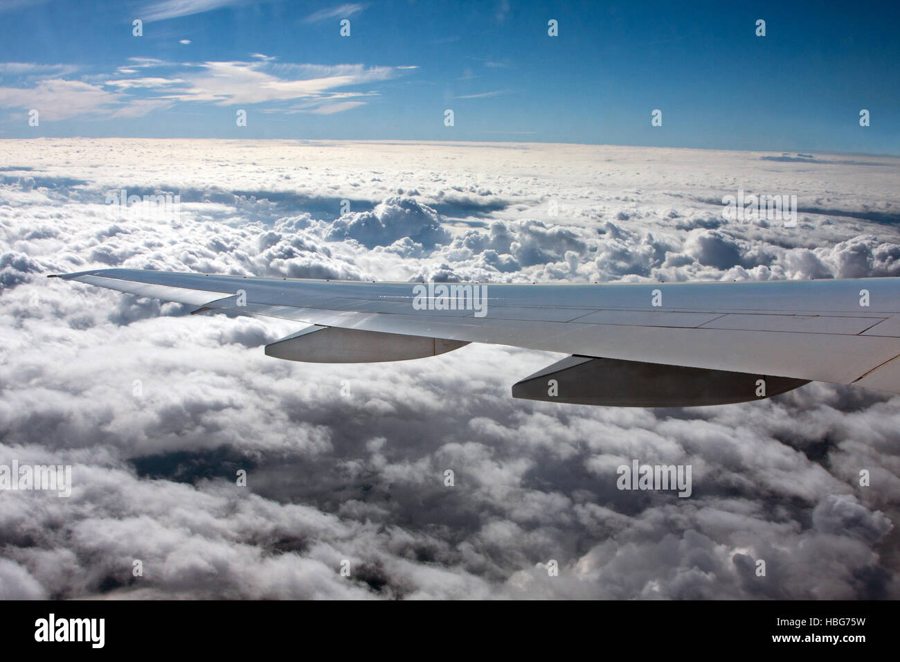 Flying above clouds Stock Photo