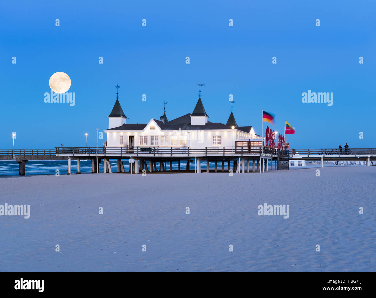 Ahlbeck seaside resort pier at dusk, full moon, Ahlbeck, Heringsdorf, Usedom, Baltic Sea, Mecklenburg-Western Pomerania, Germany Stock Photo