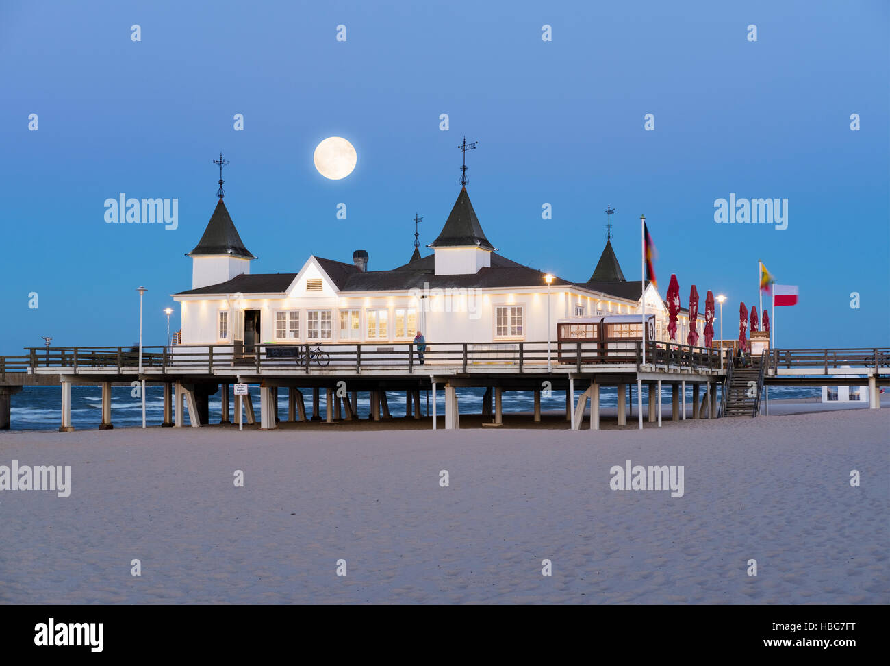 Ahlbeck seaside resort pier at dusk, full moon, Ahlbeck, Heringsdorf, Usedom, Baltic Sea, Mecklenburg-Western Pomerania, Germany Stock Photo